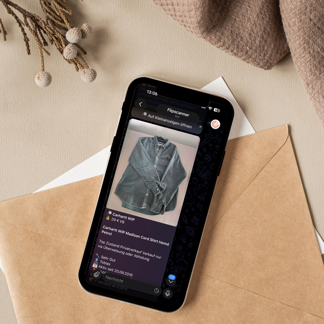 Smartphone mit Flipscanner Telegram-Alert über ein Vinted-Angebot